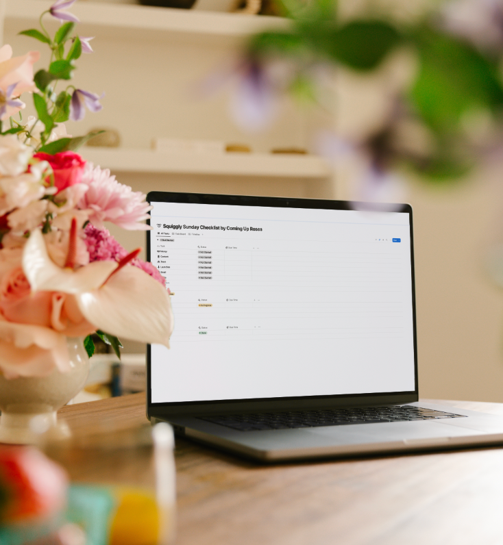Entrepreneur using weekly business planning checklist on laptop with coffee